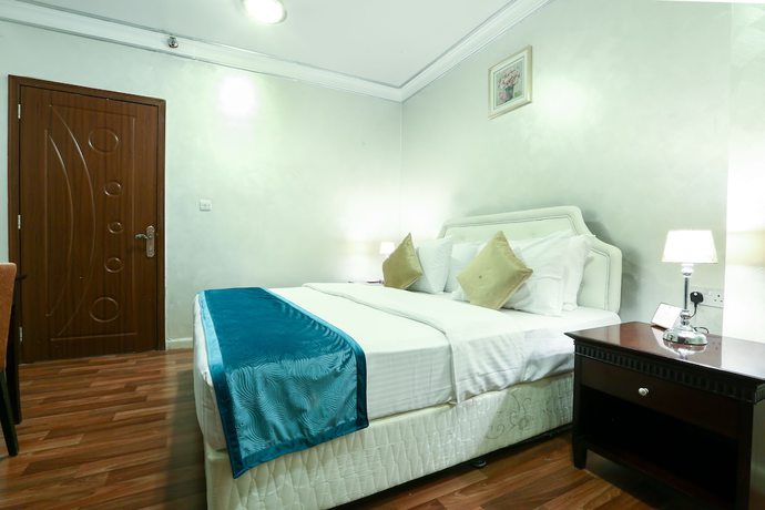 Imagen de la habitación del Hotel La Villa Suites. Foto 13