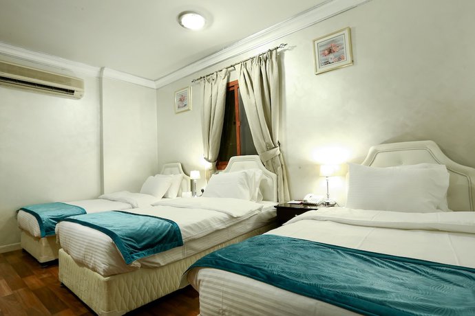 Imagen de la habitación del Hotel La Villa Suites. Foto 14