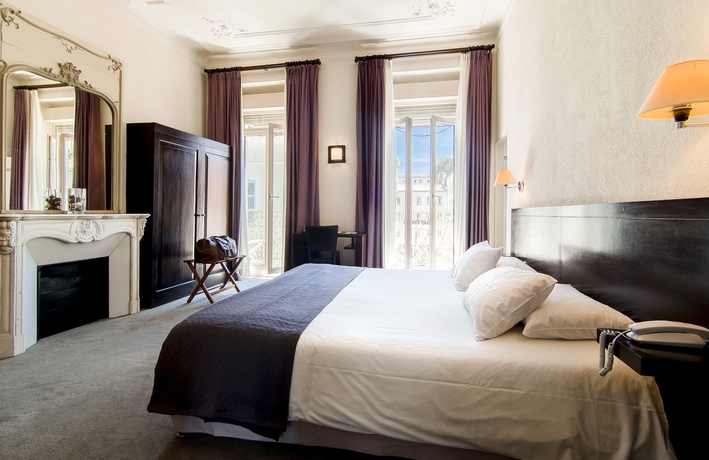 Imagen de la habitación del Hotel La Villa Tosca. Foto 5