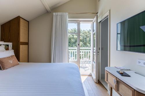 Imagen de la habitación del Hotel La Villa du Moulleau. Foto 17