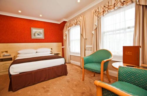 Imagen de la habitación del Hotel La Villette. Foto 13