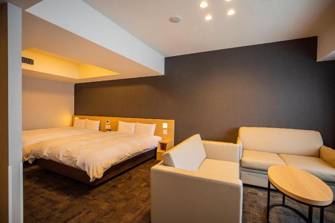 Imagen de la habitación del Hotel La Vista Furano Hills Natural Hot Spring. Foto 5