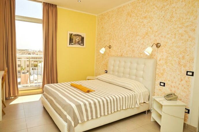Imagen de la habitación del Hotel La Vita E\' Bella Ristorante. Foto 15