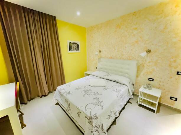 Imagen de la habitación del Hotel La Vita E\' Bella Ristorante. Foto 17