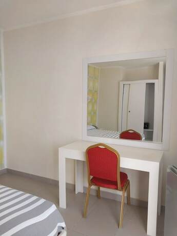 Imagen de la habitación del Hotel La Vita E\' Bella Ristorante. Foto 18