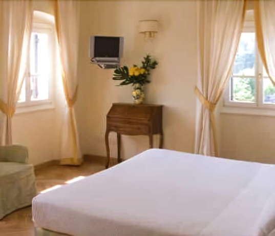 Imagen de la habitación del Hotel La Vittoria Boutique. Foto 14