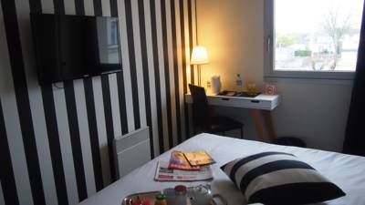 Imagen de la habitación del Hotel La Voile Rouge. Foto 5