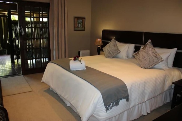 Imagen de la habitación del Hotel La Vue Guest Lodge and Function Venue. Foto 13