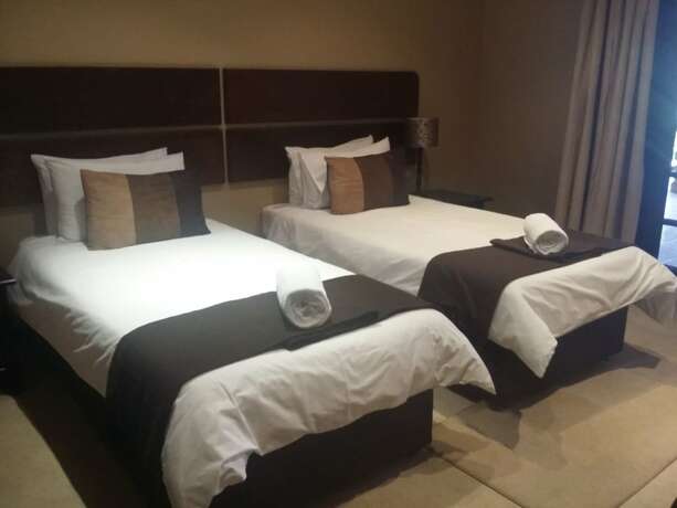 Imagen de la habitación del Hotel La Vue Guest Lodge and Function Venue. Foto 21