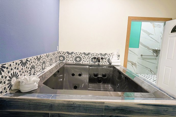 Imagen de la habitación del Hotel La Vyoma Villas, Westpark Hwy 6. Foto 8