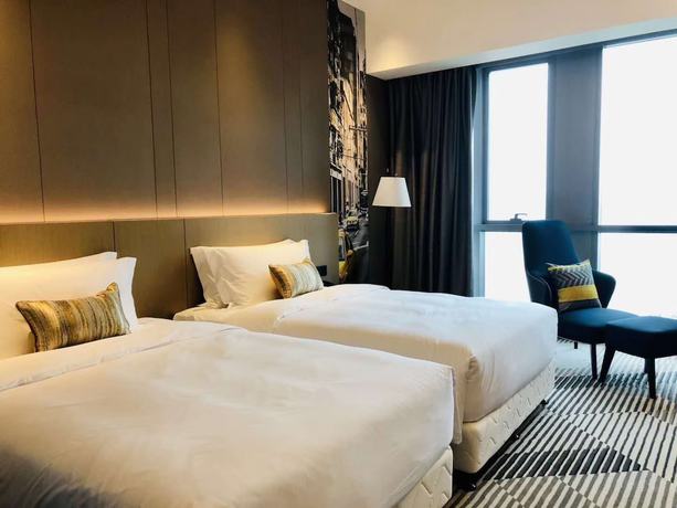 Imagen de la habitación del Hotel La Yarda Hotel Guangzhou. Foto 12