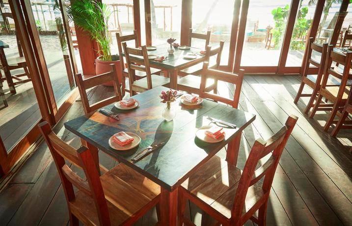 Imagen del bar/restaurante del Hotel La Zebra Tulum, a Small Luxury Hotel. Foto 9