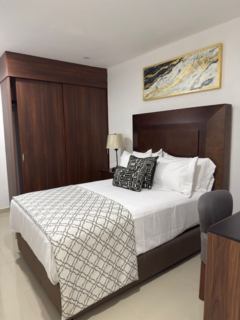 Imagen de la habitación del Hotel La casa de las palmeras. Foto 6