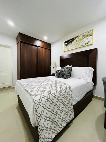 Imagen de la habitación del Hotel La casa de las palmeras. Foto 12