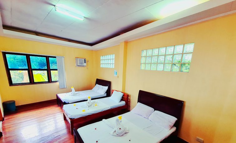 Imagen de la habitación del Hotel La-Familia Guest House. Foto 3