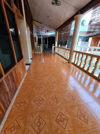 Imagen de la habitación del Hotel La-Familia Guest House. Foto 5