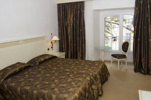 Imagen de la habitación del Hotel L'abbaye. Foto 8