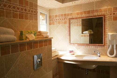 Imagen de la habitación del Hotel L'abbaye. Foto 12