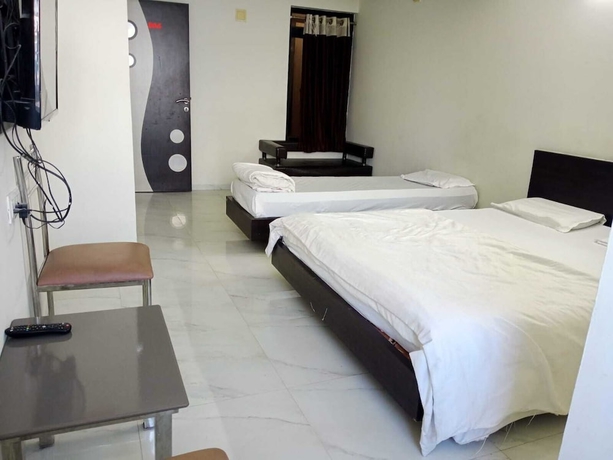 Imagen de la habitación del Hotel Labhs Morbi. Foto 7
