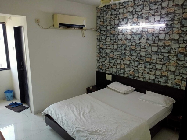 Imagen de la habitación del Hotel Labhs Morbi. Foto 9