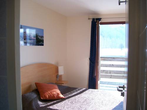 Imagen de la habitación del Hotel Lac Des Graves. Foto 2