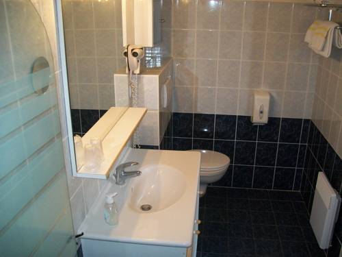 Imagen de la habitación del Hotel Lac Des Graves. Foto 16