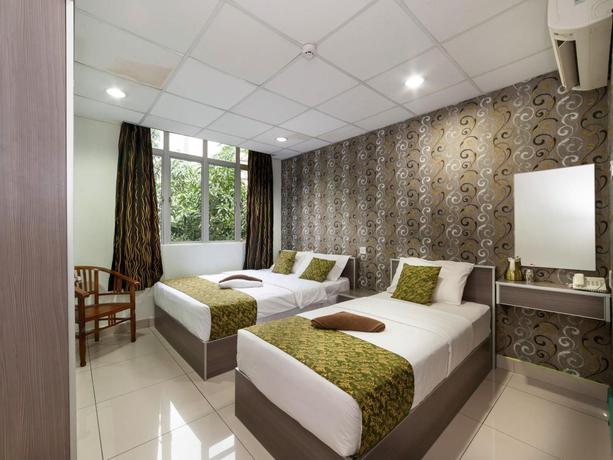 Imagen de la habitación del Hotel Lacomme Inn. Foto 5