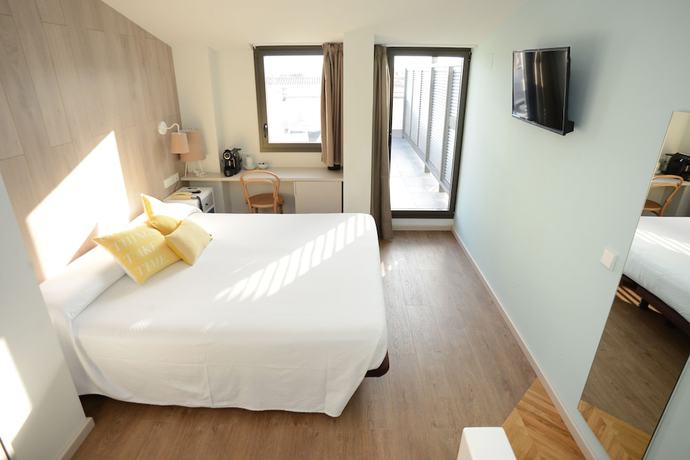 Imagen de la habitación del Hotel L&acute;Escala Centre. Foto 3