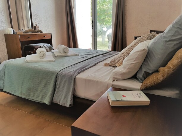 Imagen de la habitación del Hotel Ladikos Garden. Foto 19