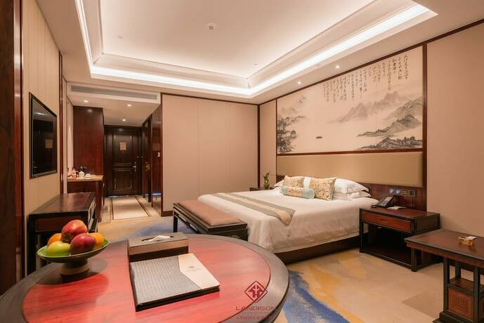 Imagen de la habitación del Hotel Ladisson Grand World Dongyang. Foto 7