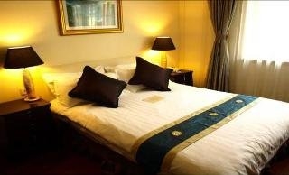 Imagen de la habitación del Hotel Ladoll Service Apartment. Foto 7