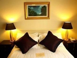 Imagen de la habitación del Hotel Ladoll Service Apartment. Foto 10