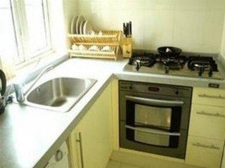 Imagen de la habitación del Hotel Ladoll Service Apartment. Foto 11