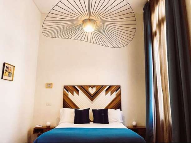 Imagen de la habitación del Hotel L'adresse Boutique. Foto 7