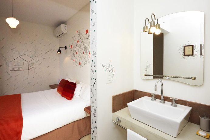 Imagen de la habitación del Hotel L'adresse Boutique. Foto 15