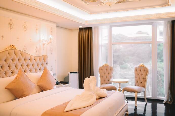 Imagen de la habitación del Hotel Lafaayette Luxury Suites Baguio. Foto 13