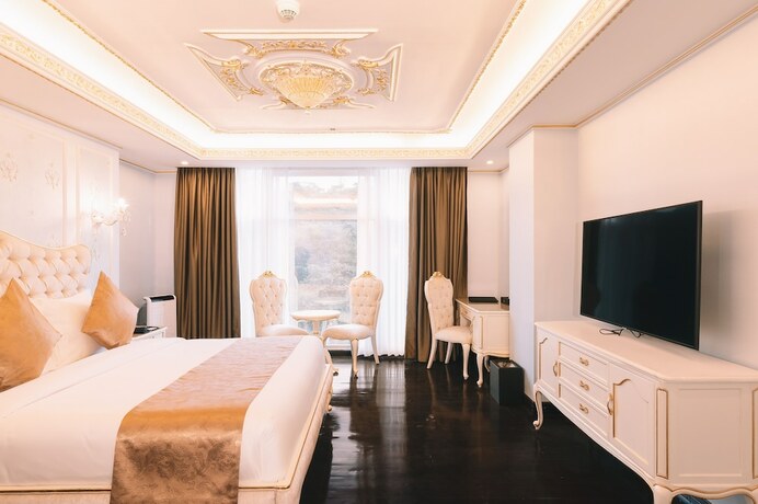 Imagen de la habitación del Hotel Lafaayette Luxury Suites Baguio. Foto 17