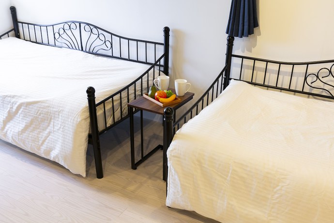 Imagen de la habitación del Hotel Laffitte Hirai Condominium Hotel. Foto 4