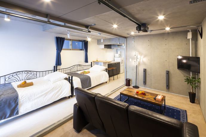 Imagen de la habitación del Hotel Laffitte Hirai Condominium Hotel. Foto 11