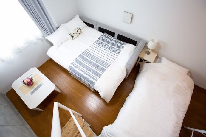 Imagen de la habitación del Hotel Laffitte Hirai Condominium Hotel. Foto 19