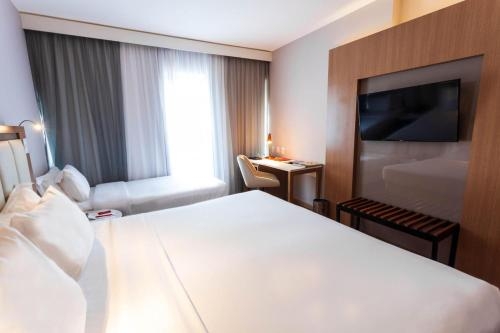 Imagen de la habitación del Hotel Laghetto Stilo Barra. Foto 9