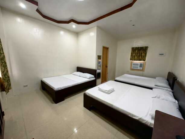 Imagen de la habitación del Hotel Lagnason's Place. Foto 12