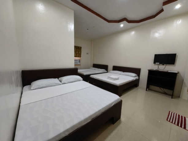 Imagen de la habitación del Hotel Lagnason's Place. Foto 16