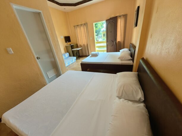 Imagen de la habitación del Hotel Lagnason's Place. Foto 17