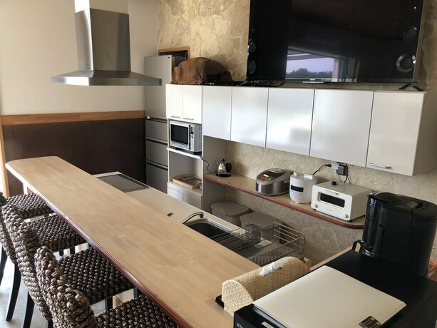 Imagen de la habitación del Hotel Lagoon Villa Ryusei. Foto 27