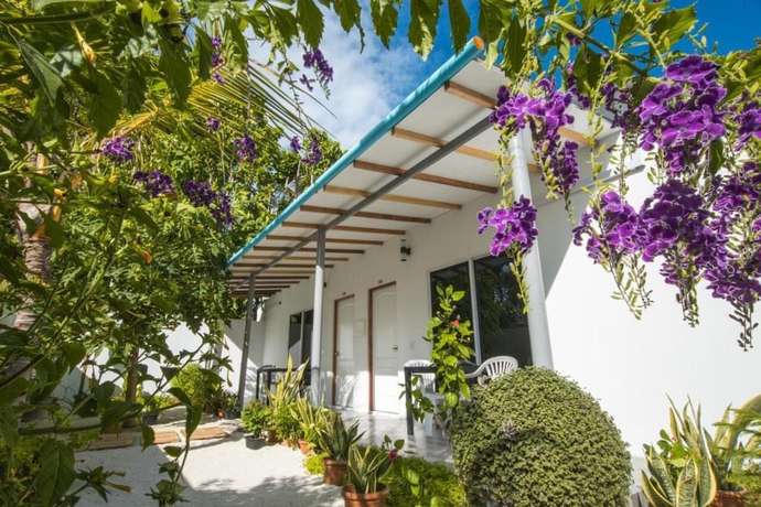 Imagen de la habitación del Hotel Lagoon Villa Thoddoo. Foto 17