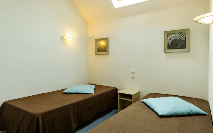 Imagen de la habitación del Hotel Lagrange Vacances Le Hameau De Peemor Pen. Foto 7