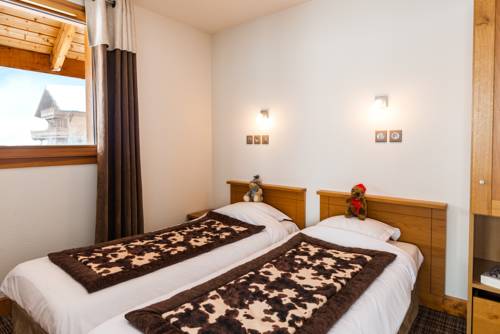 Imagen de la habitación del Hotel Lagrange Vacances Les Balcons Des Aiguilles. Foto 8