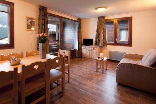 Imagen de la habitación del Hotel Lagrange Vacances Les Chalets Du Mont Blanc. Foto 11