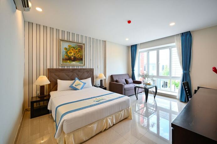 Imagen de la habitación del Hotel Laguna, District 7 - Ho Chi Minh. Foto 14